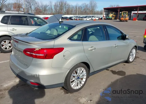 2015 Ford Focus Titanium из США, поврежденный, VIN 1FADP3J23FL373450